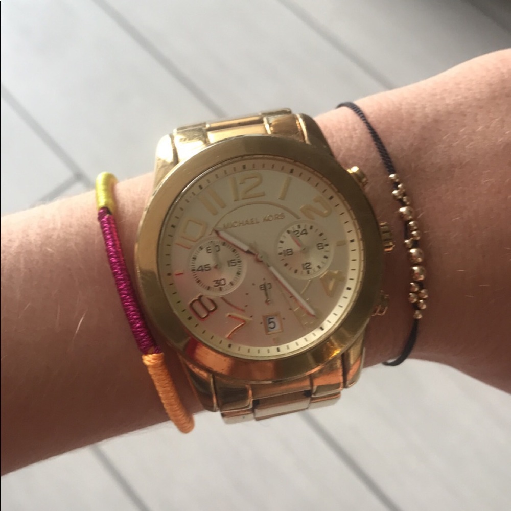 Michael Kors women’s oversized gold watch